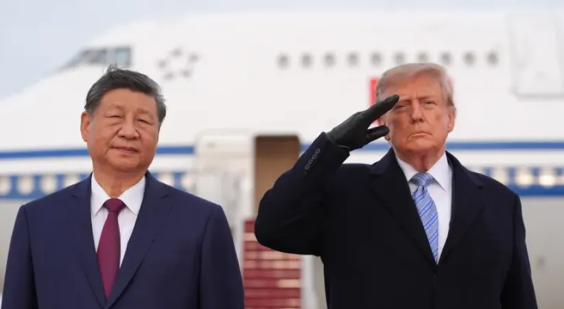 Trump, Xi’yi hava üssünde kırmızı halıyla karşıladı